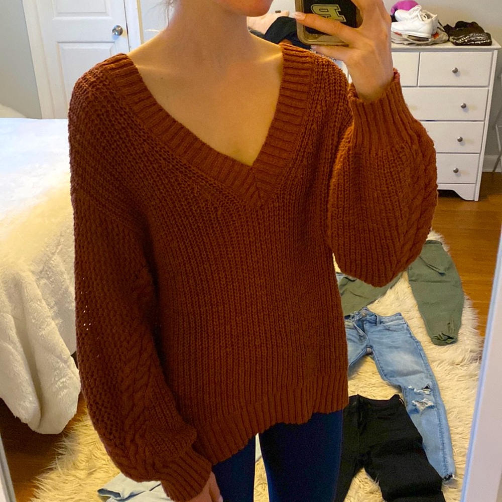 Brown v-neck sweater by American Eagle. Size small but oversized